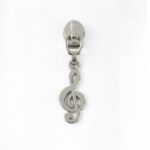 Curseur de fermeture éclair clef de sol argent