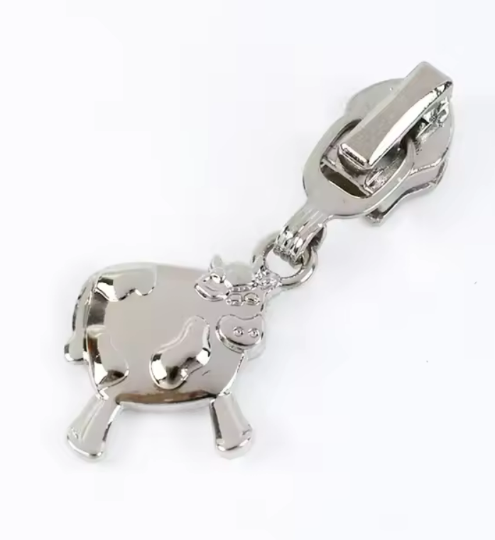Curseur de fermeture éclair vache argent