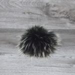 Pompon vraie fourrure noir pointe blanche