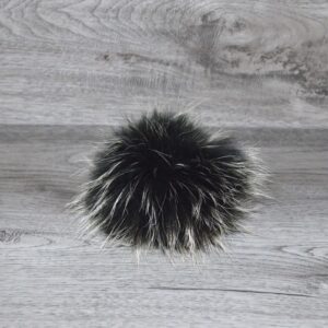 Pompon vraie fourrure noir pointe blanche